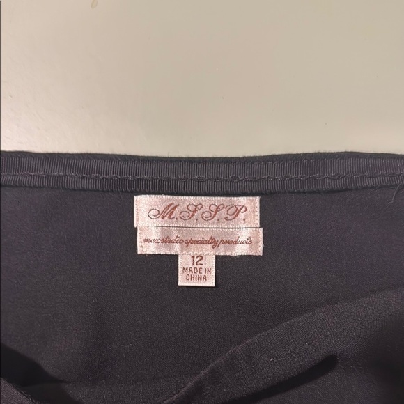 Black Mini Pencil Skirt with Ruffled Hem, Zipper & Button Closure - Picture 4 of 9